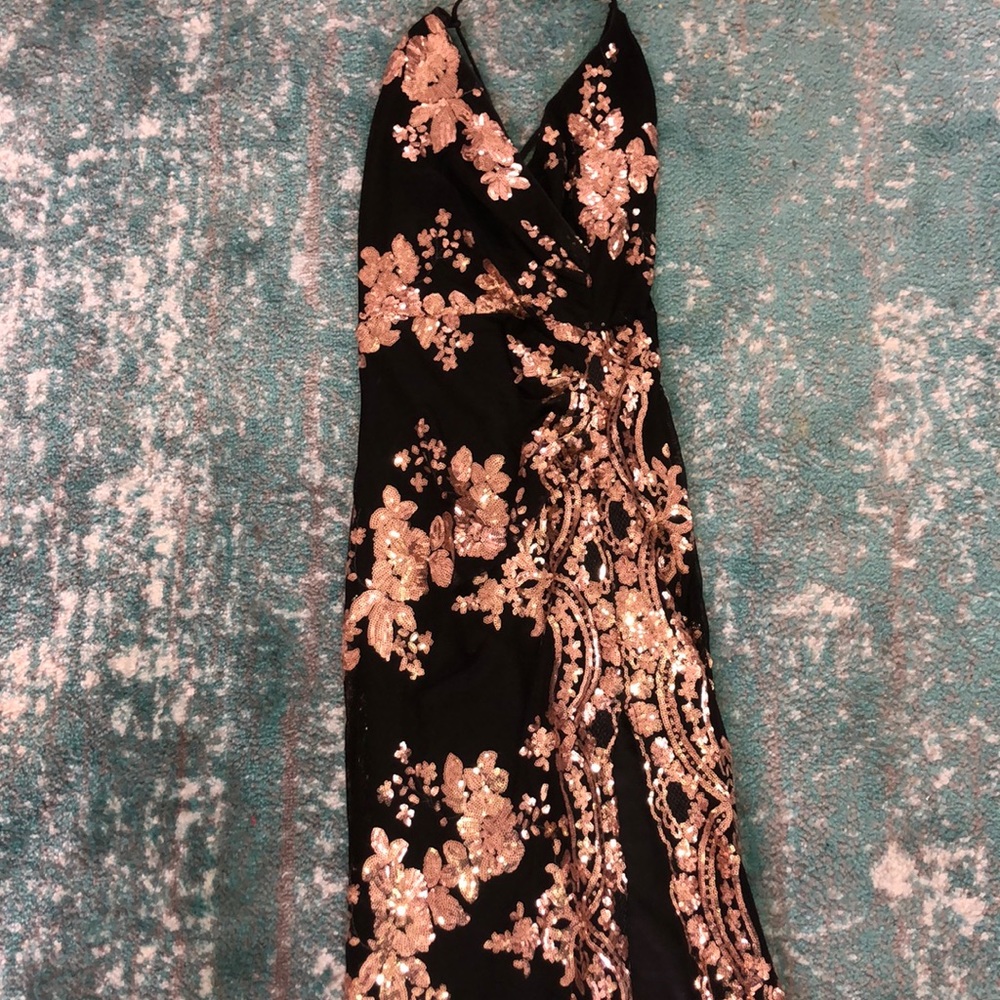 Form fitting dress w/ leg slit & criss cross back